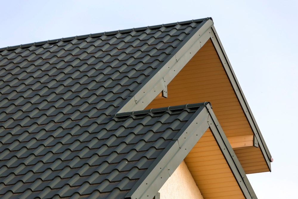 close up detail new modern house top with shingled green roof